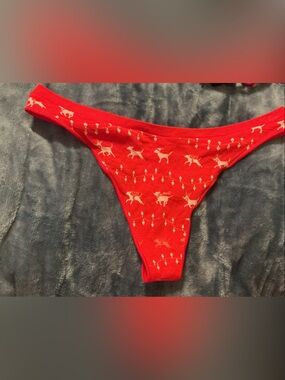 Victoria's Secret Red Thong with Cream Dog Print